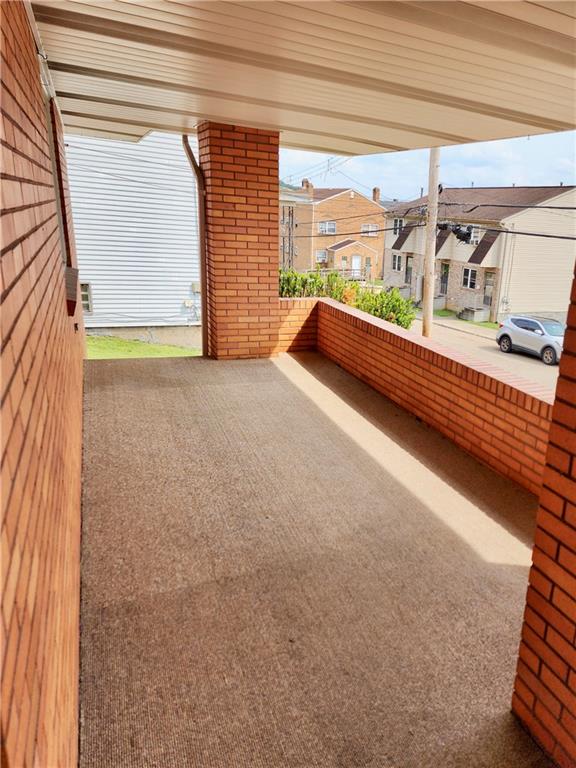 830 Ridge Avenue McKees Rocks, PA 15136 - Photo 5 of 50 Front Porch is all covered with all outdoor carpet