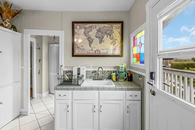 a bathroom with sink and mirror