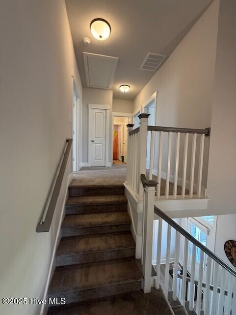 203 Farmstead Loop Moyock, NC 27958 - Photo 38 of 75 STAIRS TO 2ND LEVEL, WHICH SPLIT OFF TO ADDITIONAL STAIRS FOR RIGHT SIDE AND LEFT SIDE OF THE HOUE UPSTAIRS