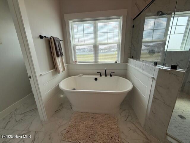 203 Farmstead Loop Moyock, NC 27958 - Photo 53 of 75 PRIMARY ENSUITE WITH FREE STANDING SOAKING TUB, SHOWER WITH DUAL SHOWERHEADS ADN RAINFALL SHOWERHEAD.