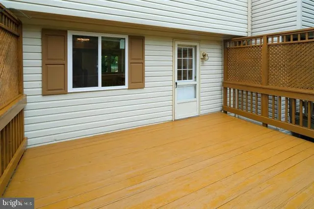 a view of outdoor space with swimming pool and deck