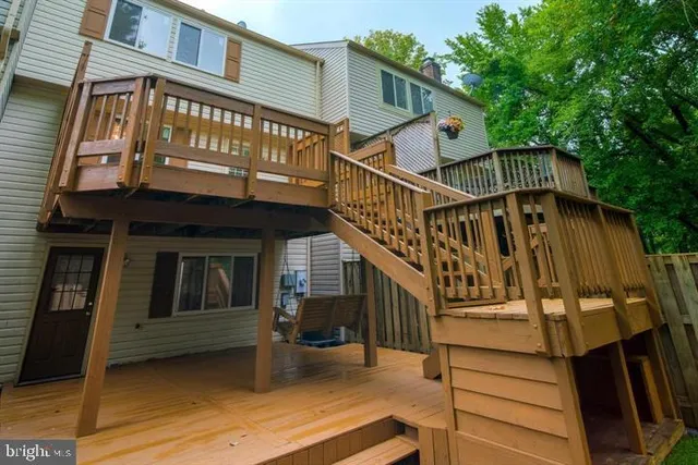 a view of a house with a small yard