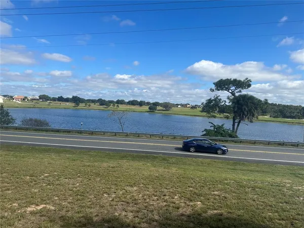 a view of a lake with a mountain