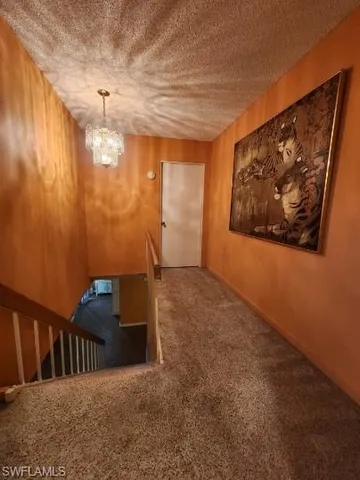 a view of hallway with stairs