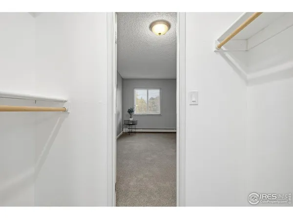 a view of a room with a hallway