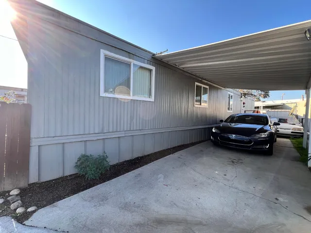 a car parked in front of a house