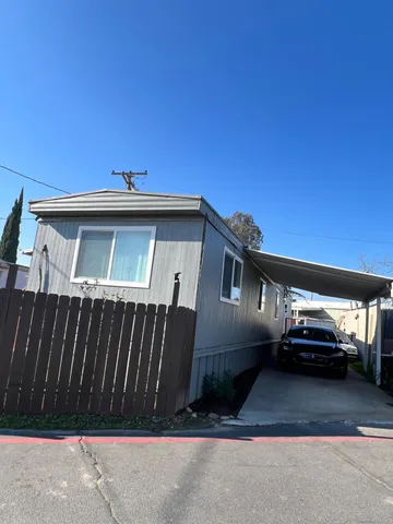 a car parked in front of a house