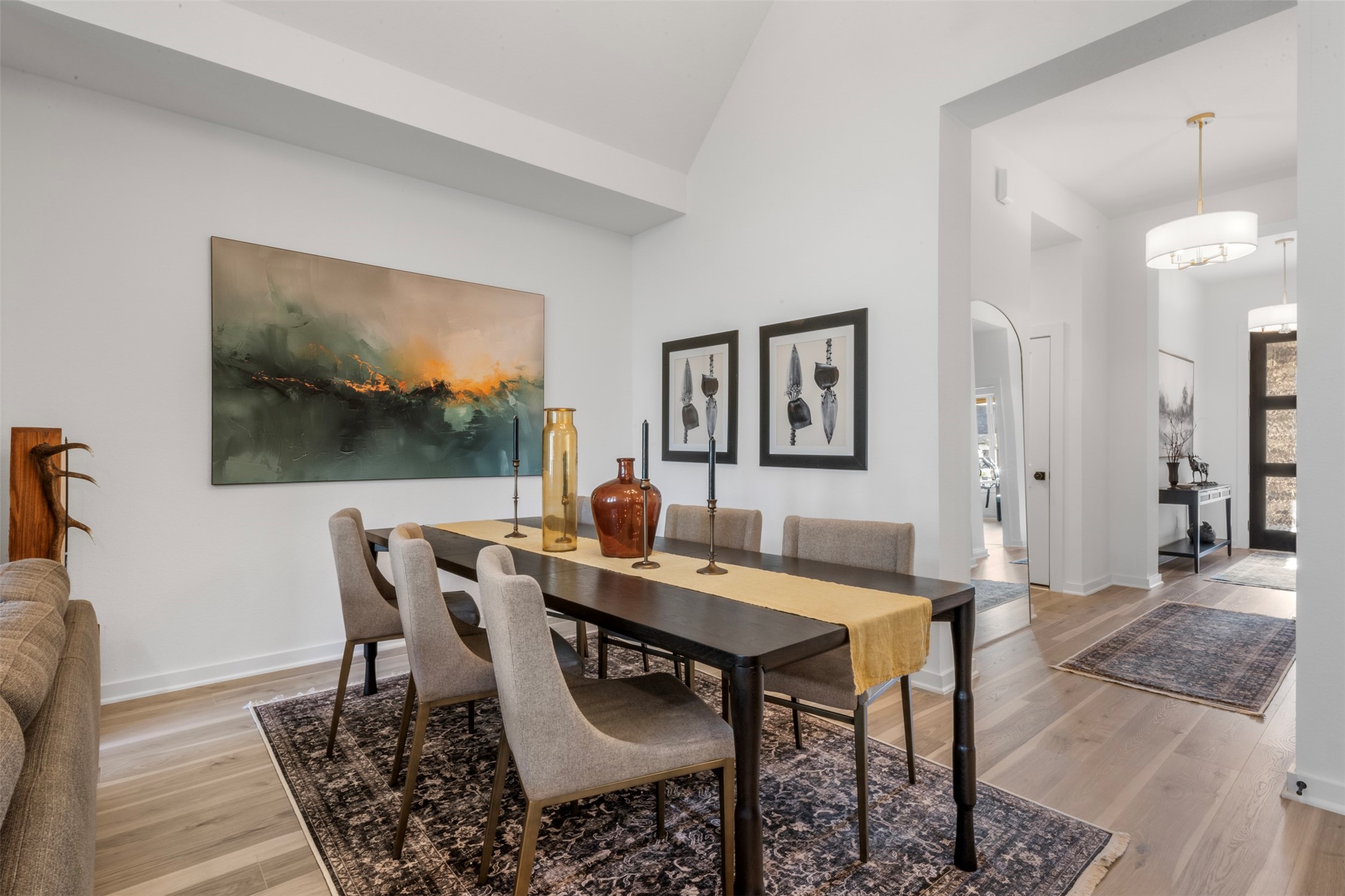 15650 Turtlehead Trail Conroe, TX 77302 - Photo 11 of 37 a view of a dining room with furniture and wooden floor