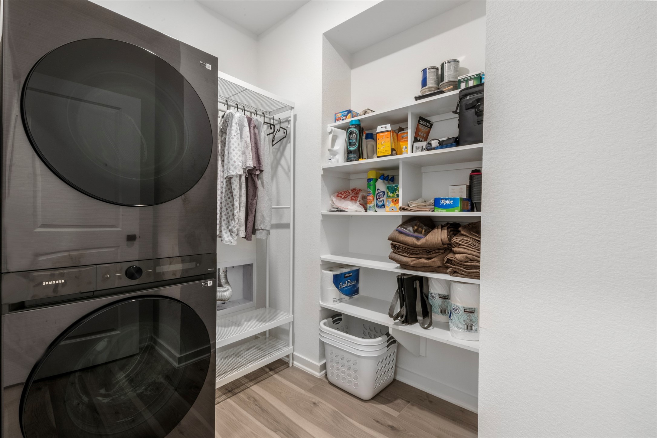 15650 Turtlehead Trail Conroe, TX 77302 - Photo 21 of 37 a kitchen with a refrigerator and wooden floor