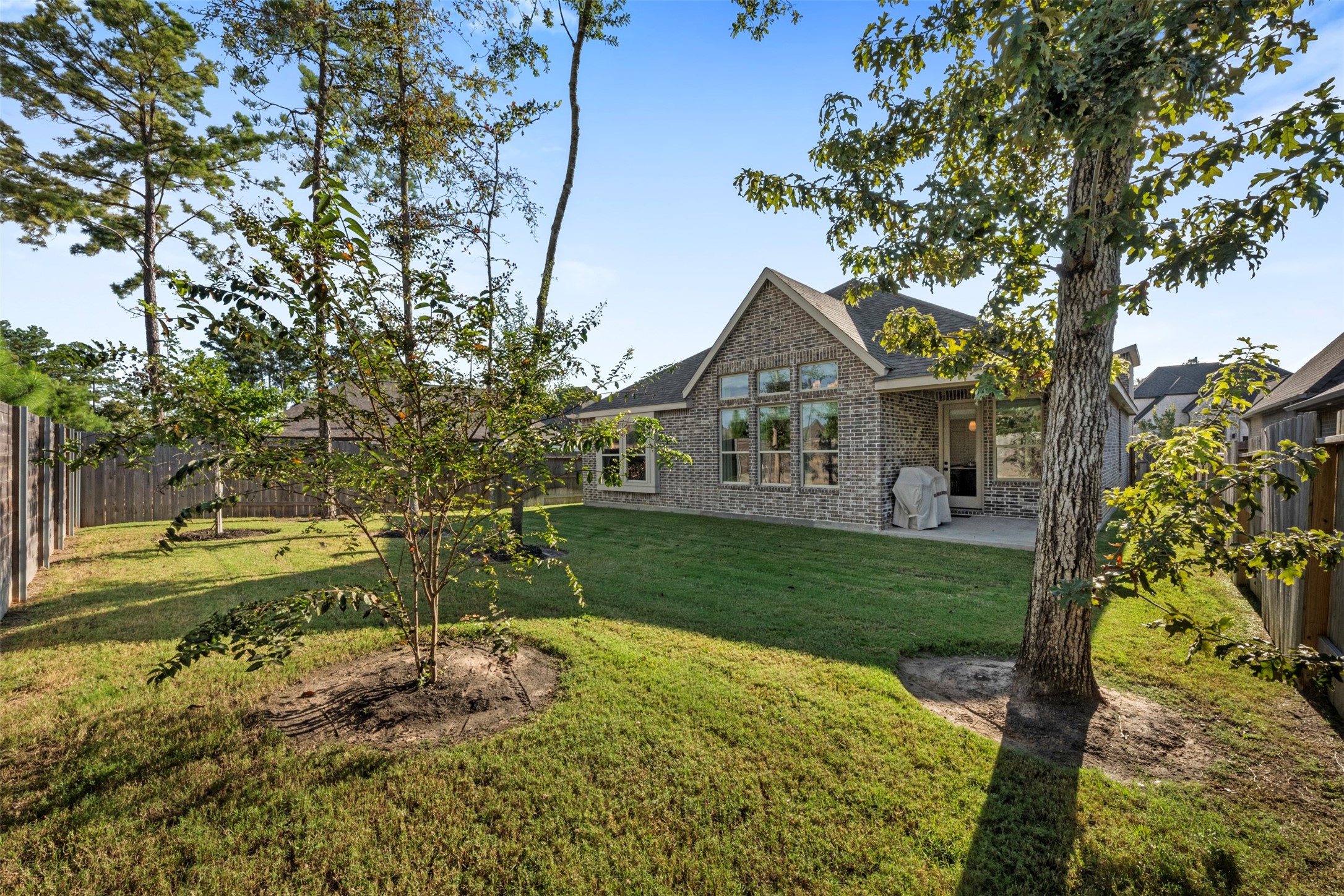 15650 Turtlehead Trail Conroe, TX 77302 - Photo 25 of 37 a front view of a house with garden