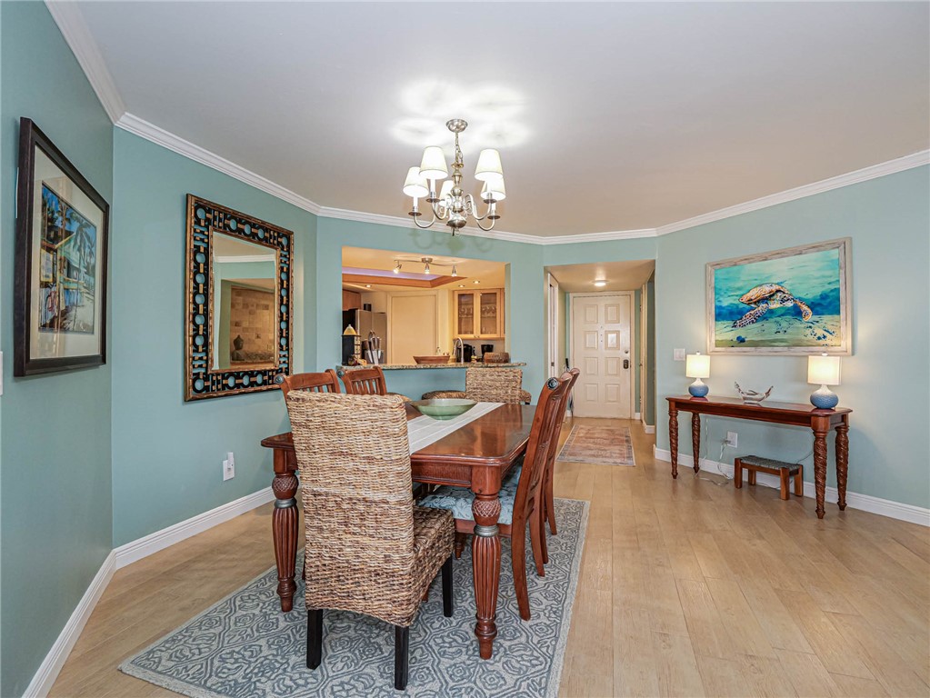 1850 Bay Road, Unit 3G Vero Beach, FL 32963 - Photo 13 of 36 a view of a dining room with furniture
