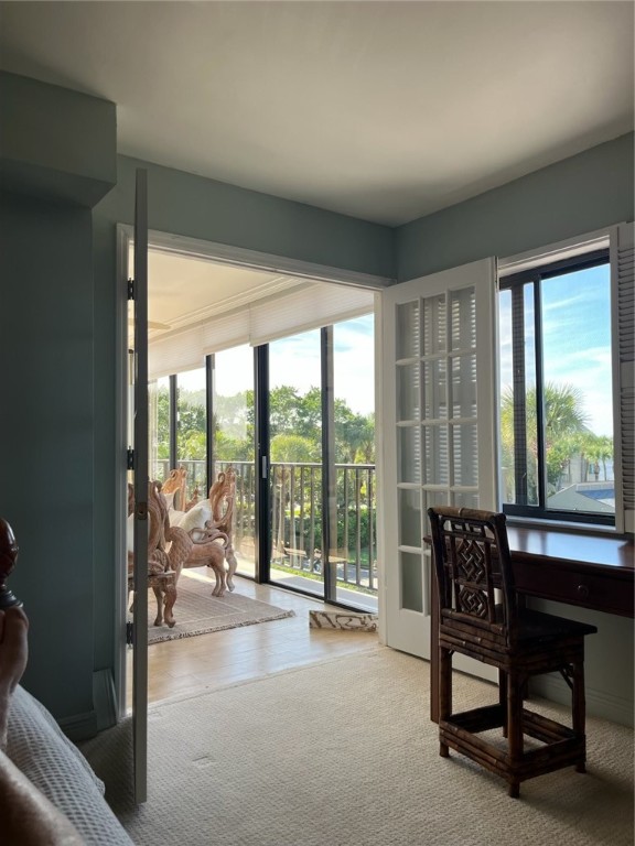 1850 Bay Road, Unit 3G Vero Beach, FL 32963 - Photo 25 of 36 a living room with furniture and a large window