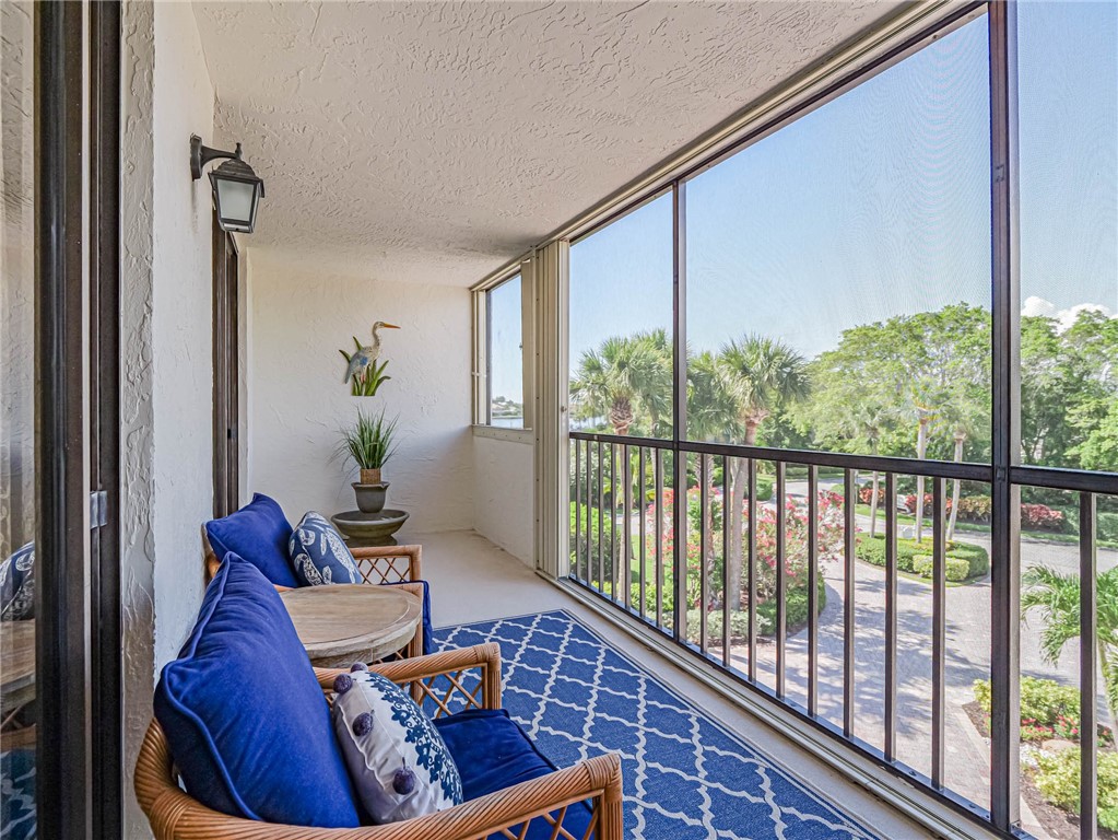 1850 Bay Road, Unit 3G Vero Beach, FL 32963 - Photo 32 of 36 a outdoor living space with furniture