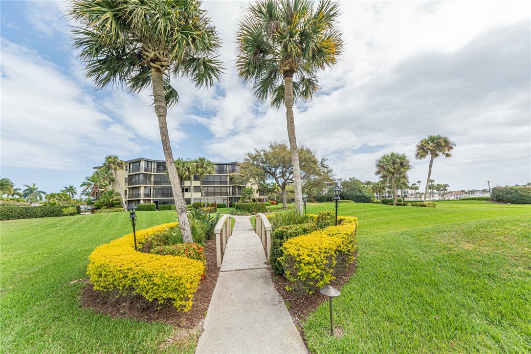 1850 Bay Road, Unit 3G Vero Beach, FL 32963 - Photo 36 of 36 a view of a lake with a garden