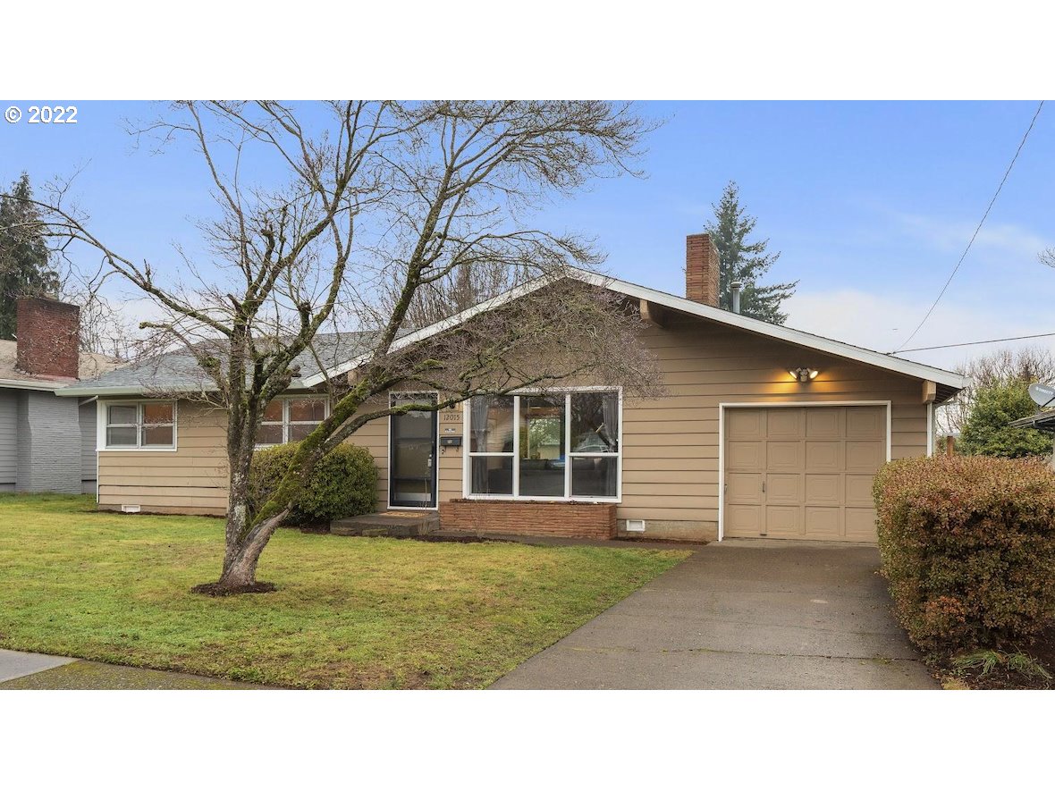 12015 Northeast Morris Street Portland, OR 97220 - Photo 1 of 23 a black and white photo of a house