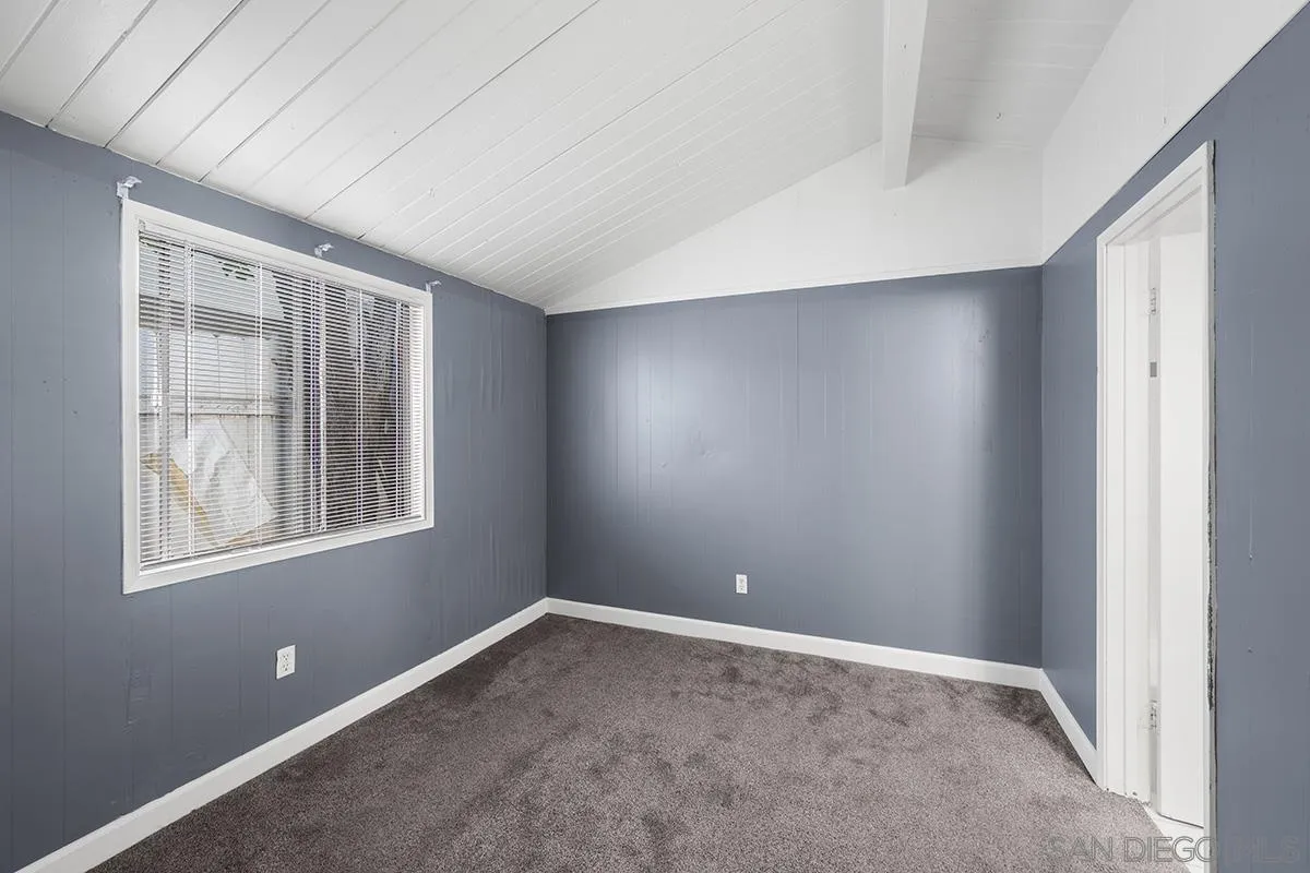 5616 Riley Street San Diego, CA 92110 - Photo 19 of 22 an empty room with windows