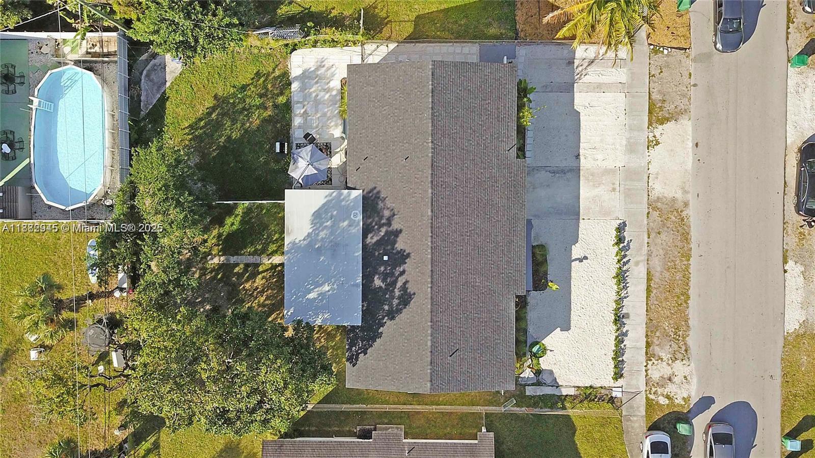 70 Northeast 186th Terrace Miami, FL 33179 - Photo 27 of 32 an aerial view of a house with swimming pool