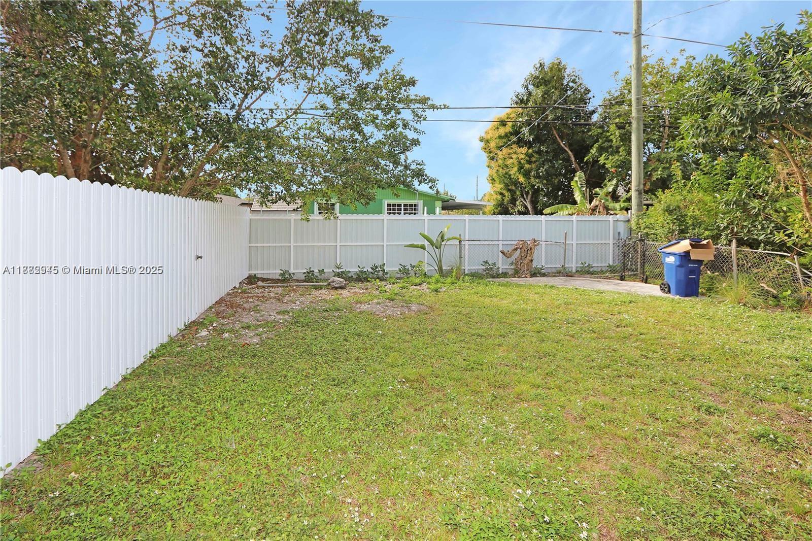 70 Northeast 186th Terrace Miami, FL 33179 - Photo 28 of 32 a view of a backyard