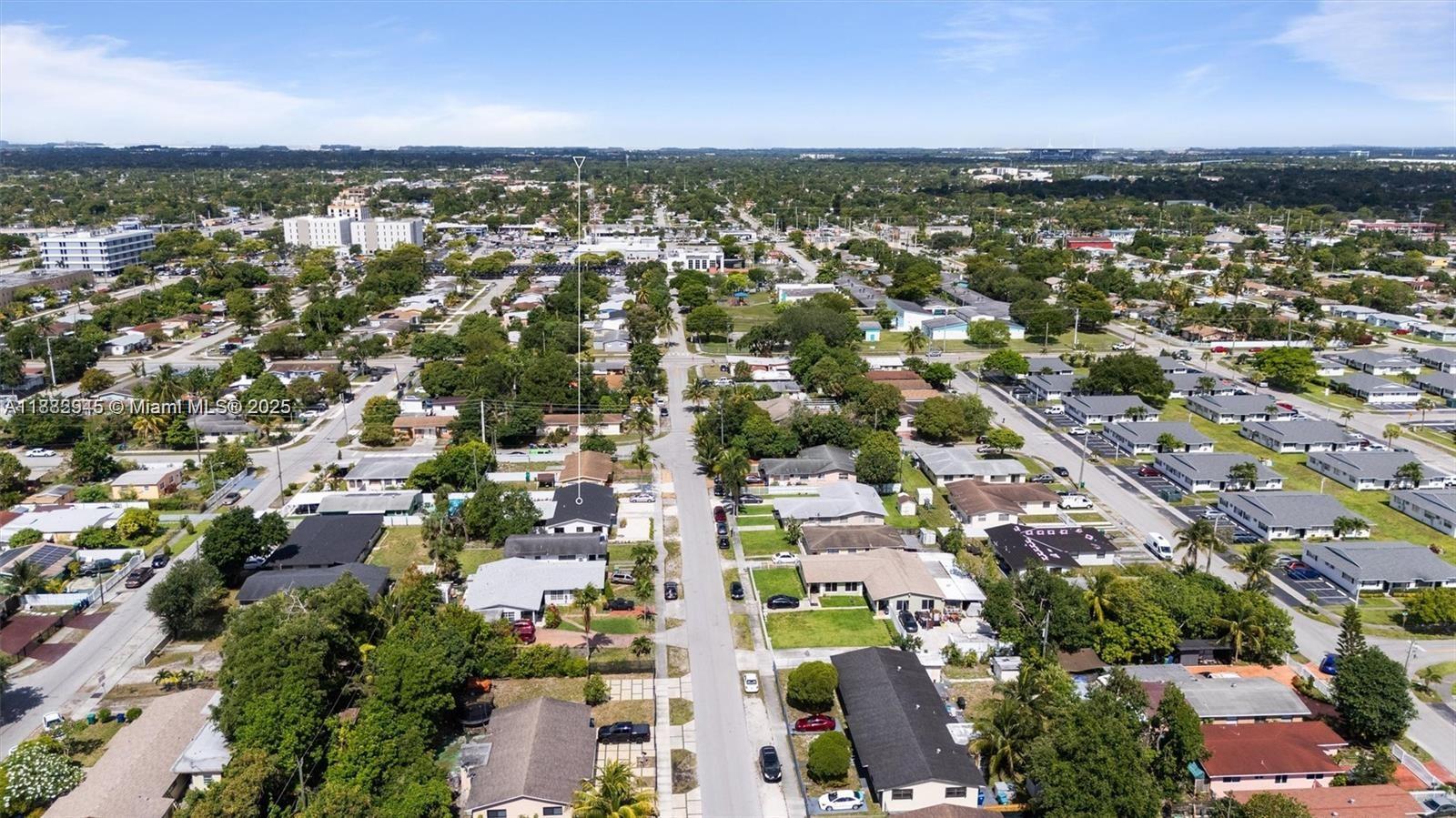 70 Northeast 186th Terrace Miami, FL 33179 - Photo 31 of 32 an aerial view of residential houses with outdoor space