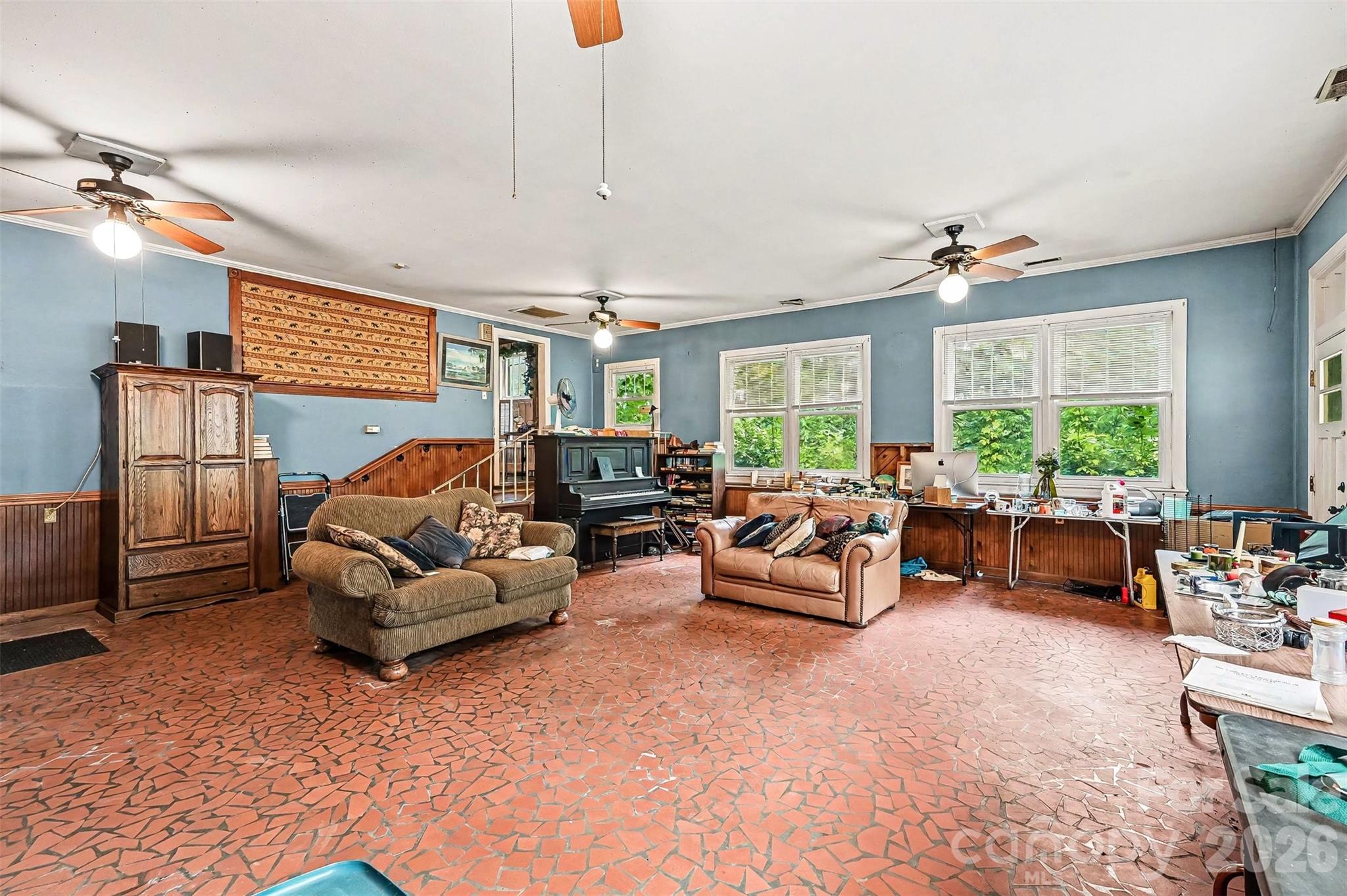 1116 Medlin Road Monroe, NC 28112 - Photo 20 of 40 a living room with furniture and a large window