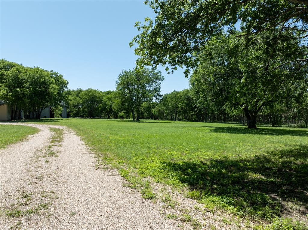 1355 North Houston Street Lorena, TX 76655 - Photo 6 of 40 a view of a garden with a park