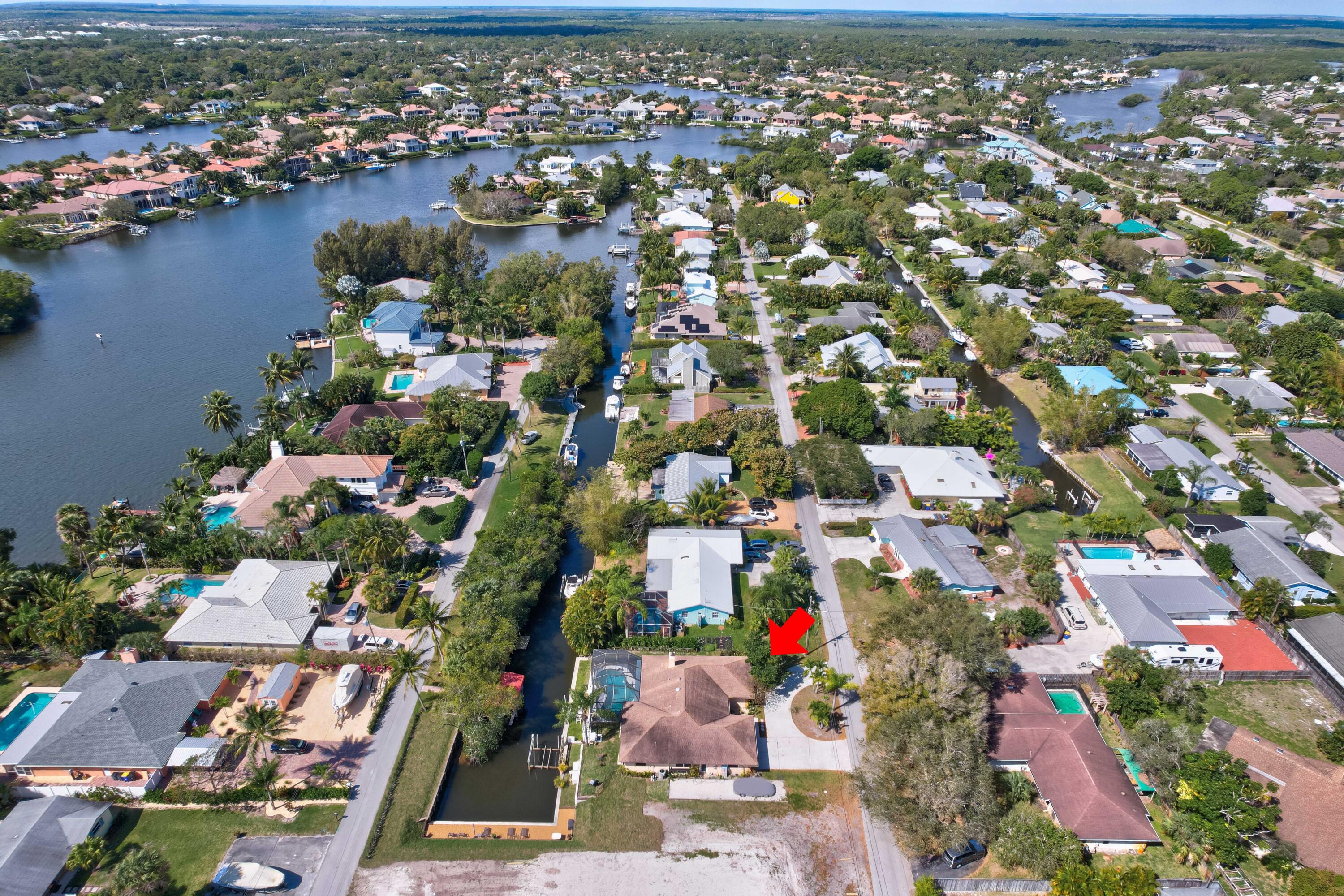 9524 Southeast Cove Point Street Jupiter, FL 33469 - Photo 44 of 58 Aerial looking west