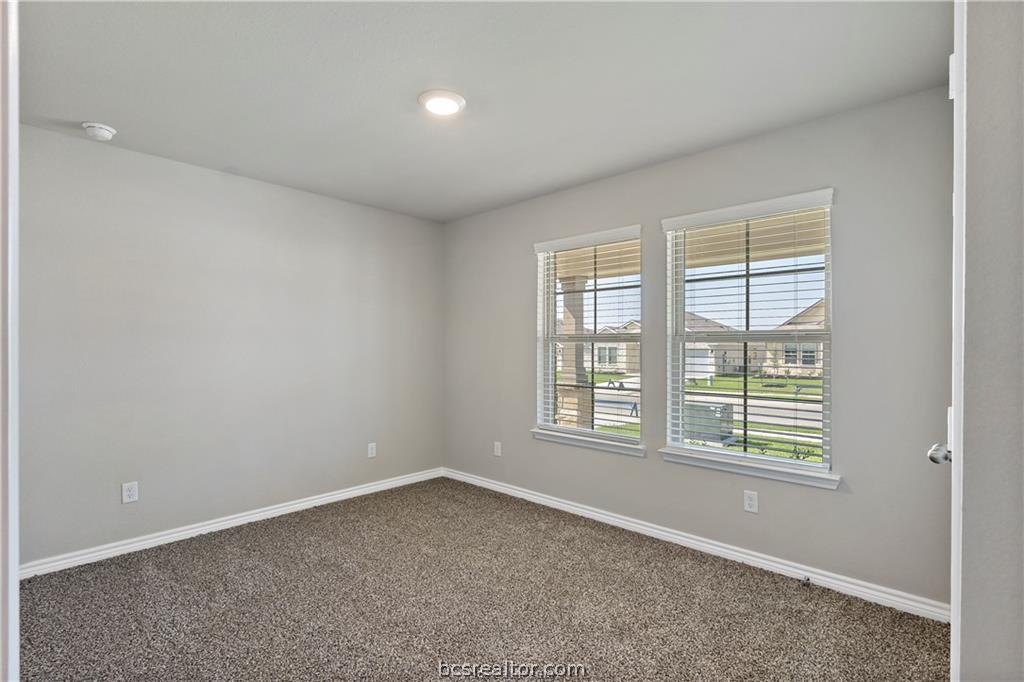 2119 Chief Street Bryan, TX 77807 - Photo 11 of 23 an empty room with a window