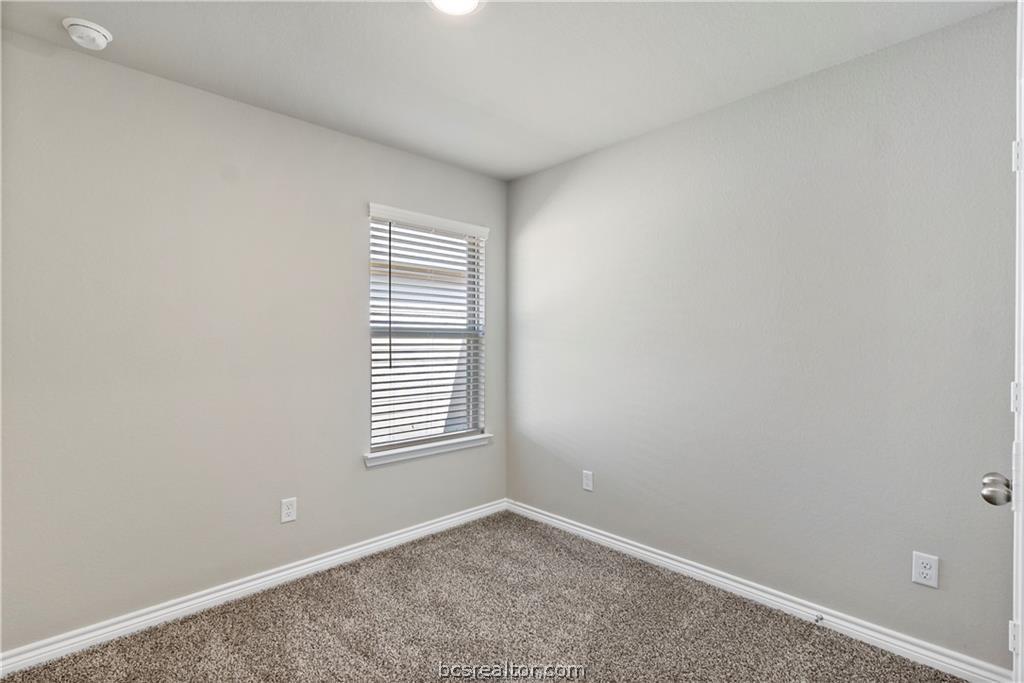 2119 Chief Street Bryan, TX 77807 - Photo 14 of 23 an empty room with windows