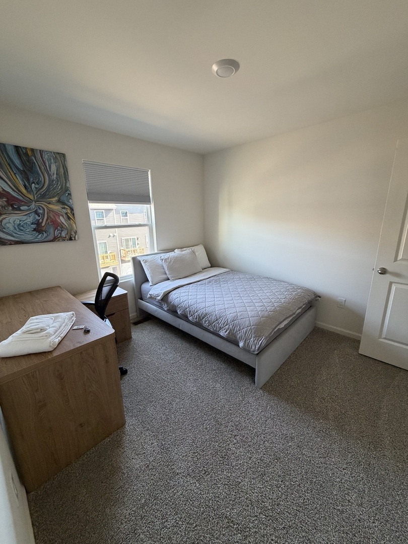 1555 Sequoia Way Pingree Grove, IL 60140 - Photo 11 of 17 a bedroom with bed and window