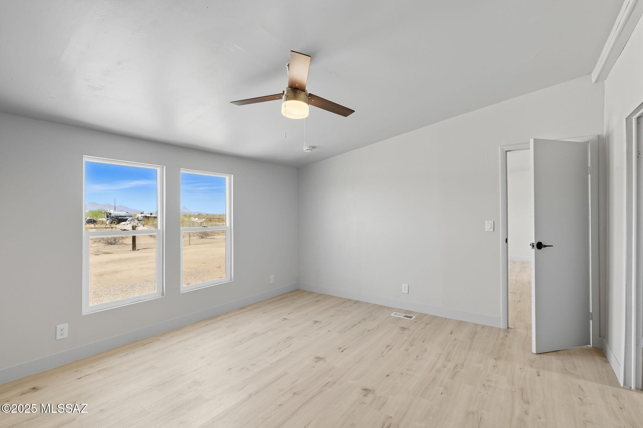 8790 North Trico Road Marana, AZ 85653 - Photo 14 of 35 a view of an empty room and window