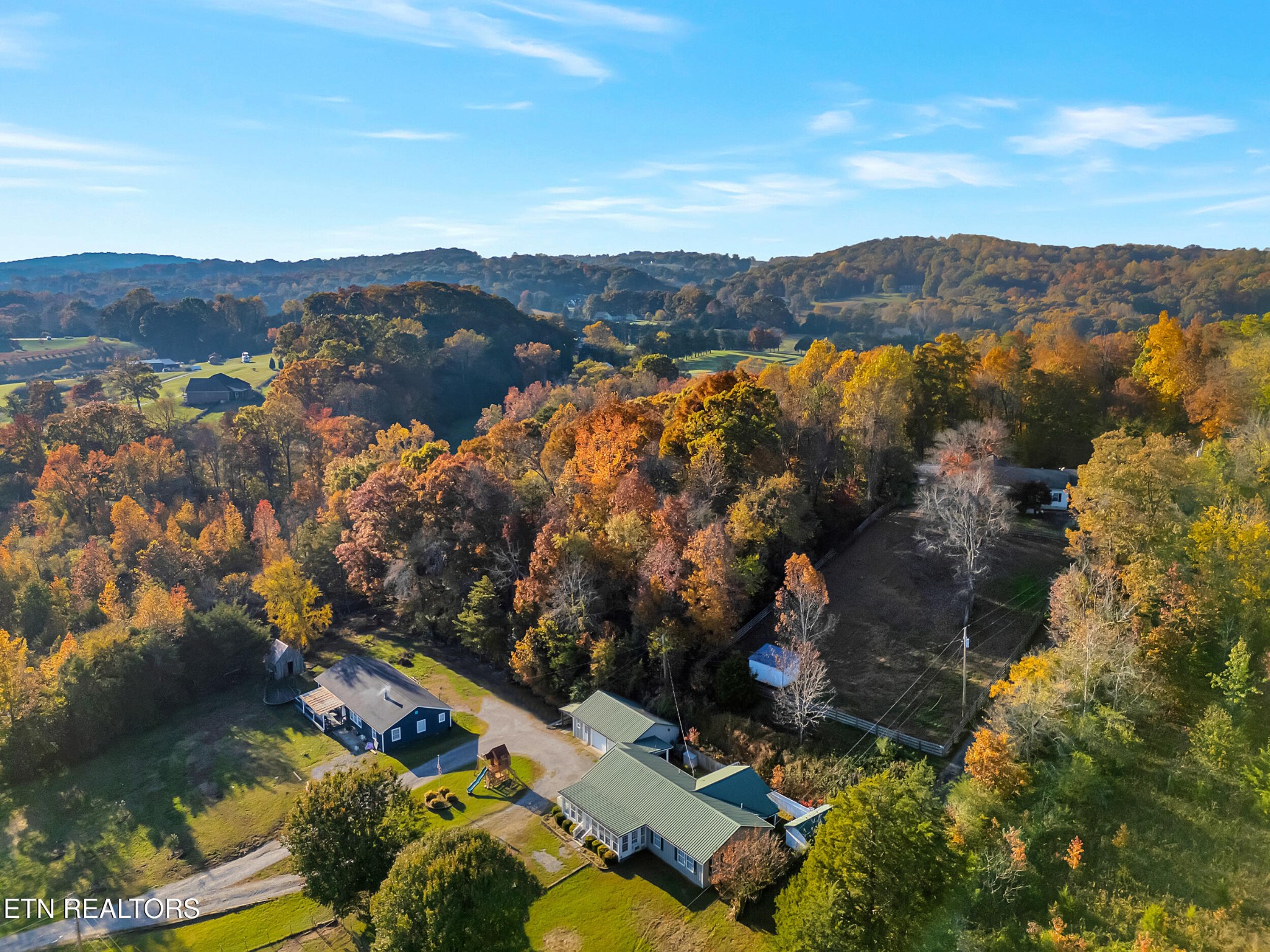 9256 Hines Valley Road Lenoir City, TN 37771 - Photo 39 of 46 an aerial view of mountain with residential house and mountain view