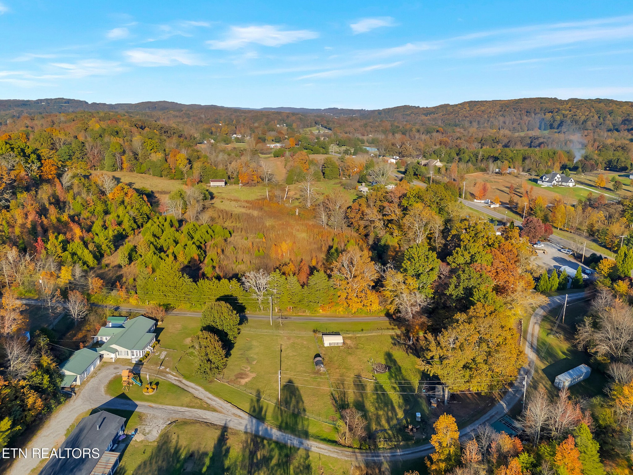 9256 Hines Valley Road Lenoir City, TN 37771 - Photo 42 of 46 a view of a city with mountains in the background