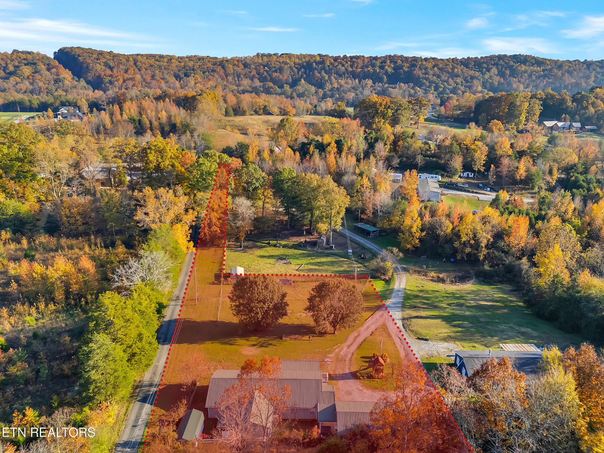 9256 Hines Valley Road Lenoir City, TN 37771 - Photo 46 of 46 an aerial view of residential houses with outdoor space