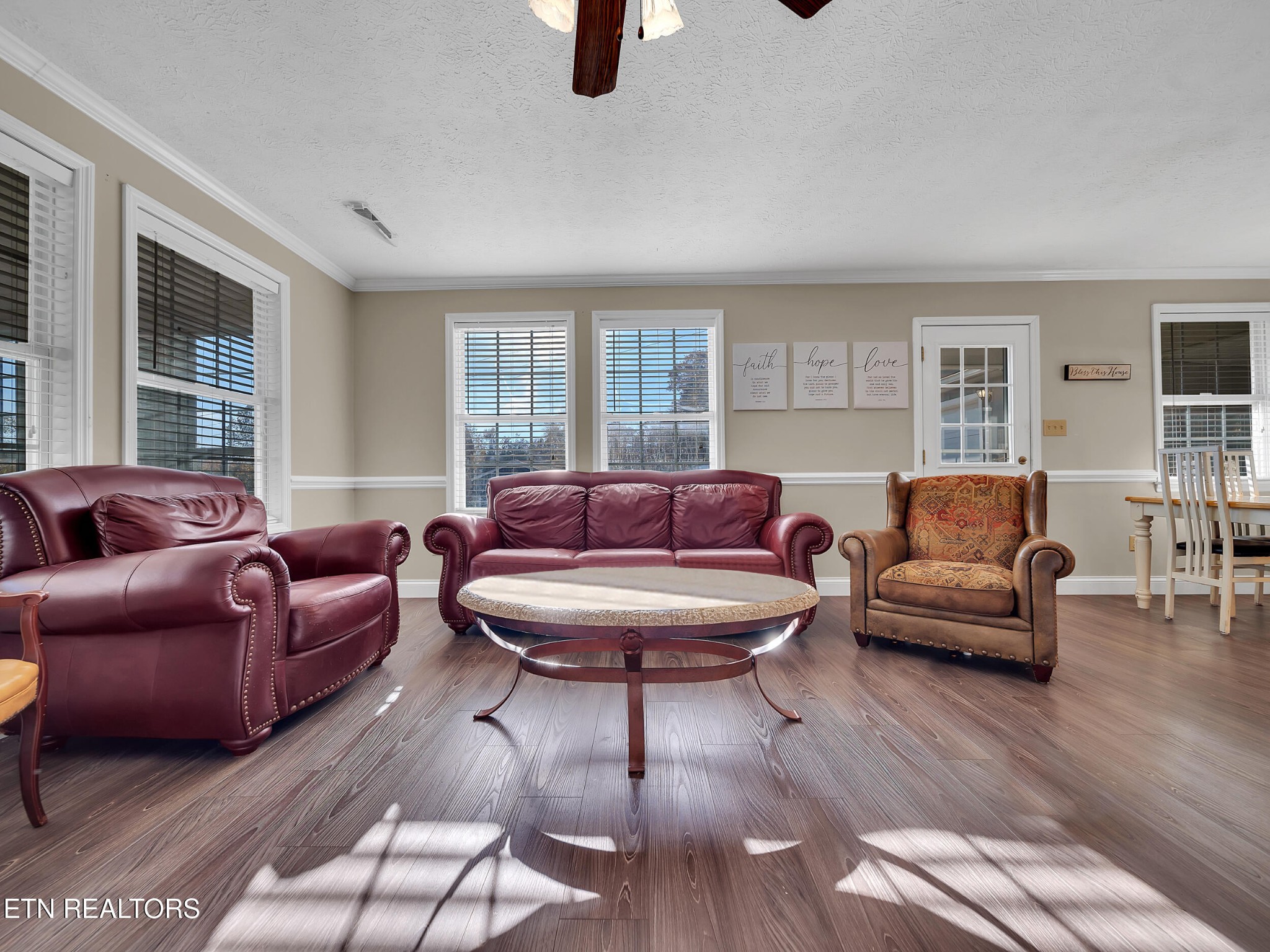 9256 Hines Valley Road Lenoir City, TN 37771 - Photo 10 of 46 a living room with furniture and a large window