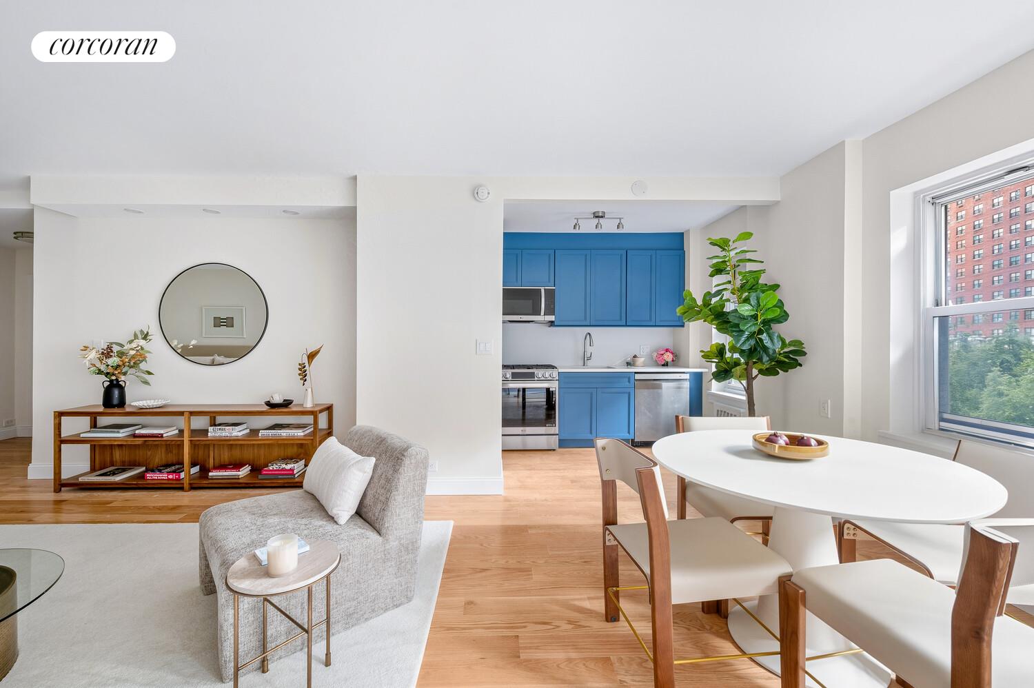 430 East 56th Street, Unit 3A Manhattan, NY 10022 - Photo 5 of 8 a dining room with furniture and wooden floor