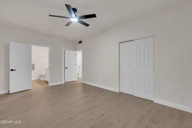 a bathroom with a double vanity sink and mirror
