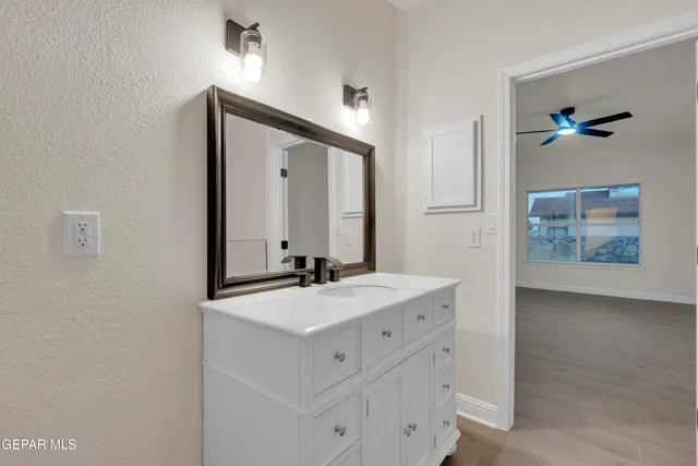 a bathroom with a tub and shower