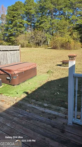 a view of a yard and ocean view
