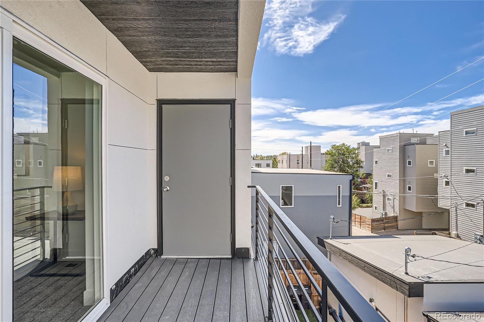 1255 Perry Street Denver, CO 80204 - Photo 24 of 28 a view of a balcony with chairs