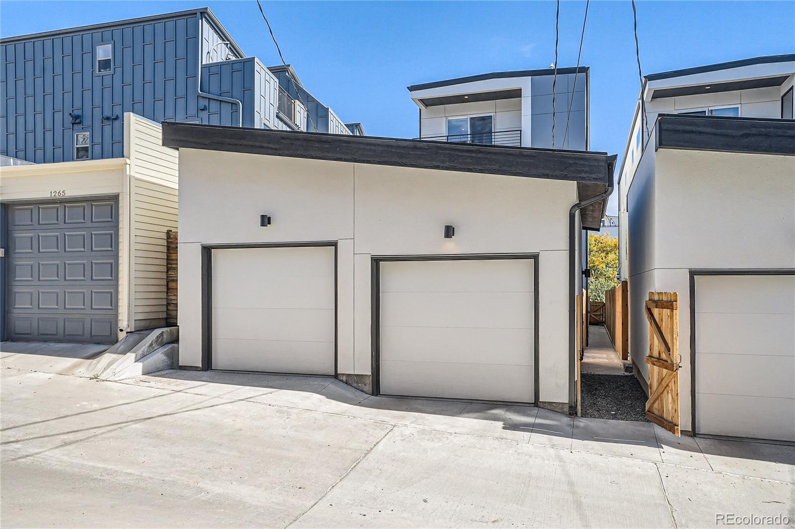 1255 Perry Street Denver, CO 80204 - Photo 28 of 28 a view of a house with garage