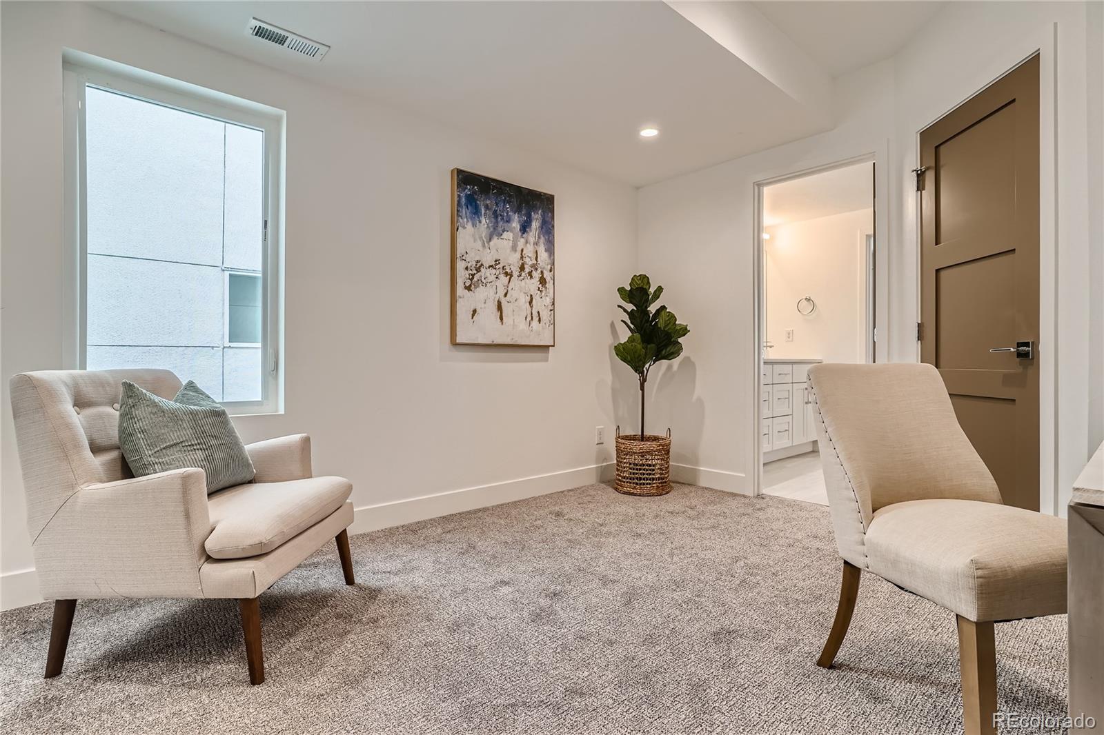 1255 Perry Street Denver, CO 80204 - Photo 10 of 28 a living room with furniture
