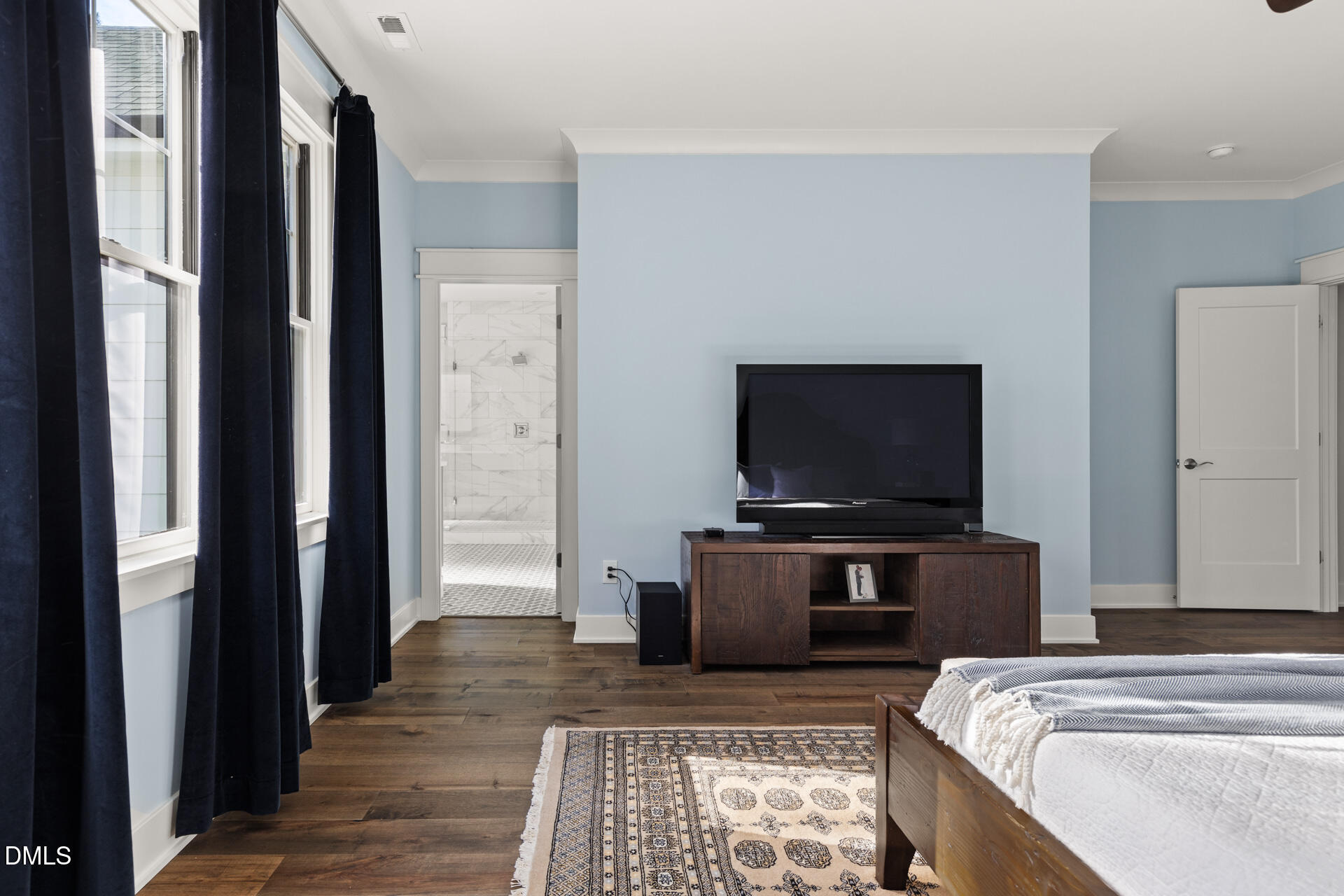 3025 Eden Harbor Court Raleigh, NC 27613 - Photo 24 of 41 a view of a livingroom with furniture and a flat screen tv