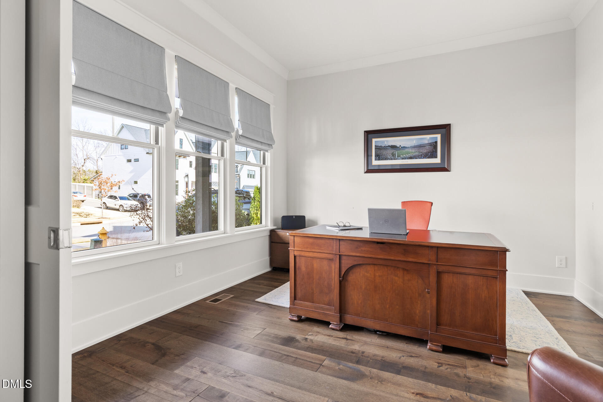 3025 Eden Harbor Court Raleigh, NC 27613 - Photo 4 of 41 a view of a workspace with furniture and a window