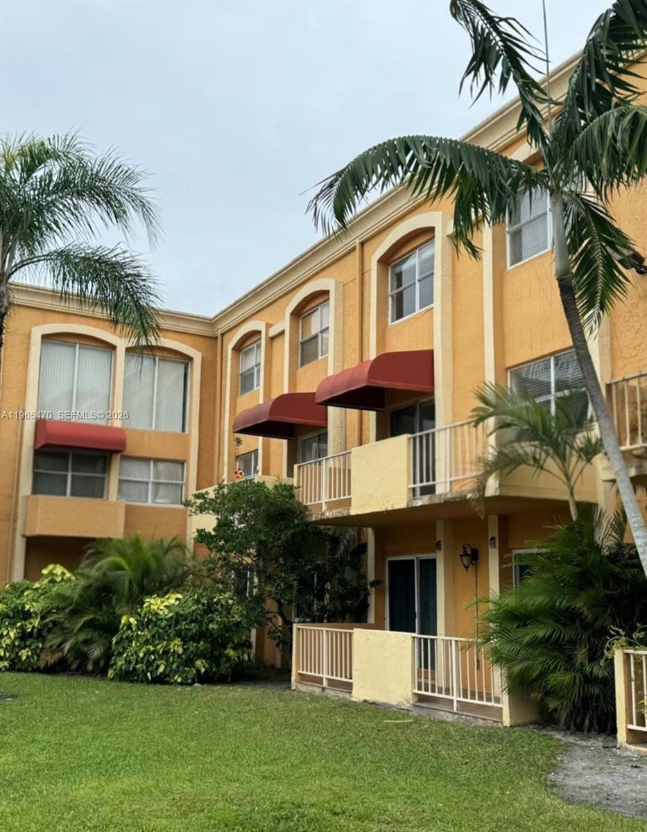 18111 Northwest 68th Avenue, Unit F103 Hialeah, FL 33015 - Photo 3 of 9