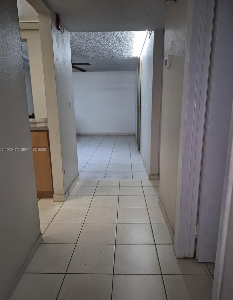 18111 Northwest 68th Avenue, Unit F103 Hialeah, FL 33015 - Photo 4 of 9