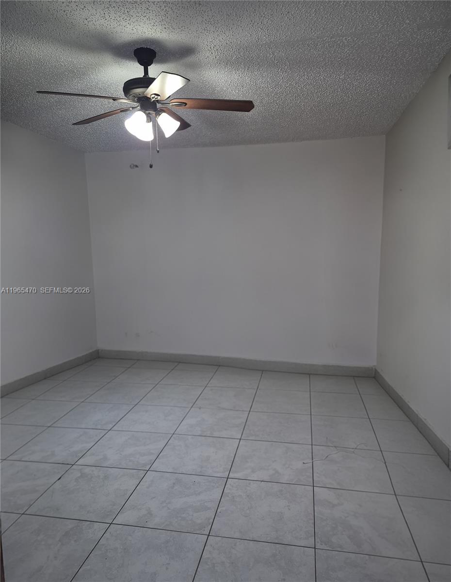 18111 Northwest 68th Avenue, Unit F103 Hialeah, FL 33015 - Photo 5 of 9