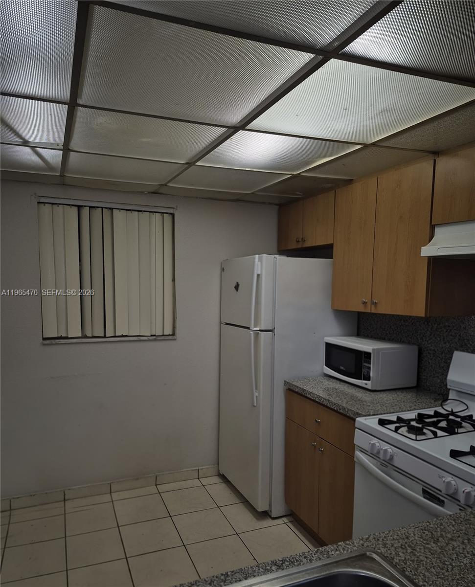 18111 Northwest 68th Avenue, Unit F103 Hialeah, FL 33015 - Photo 6 of 9