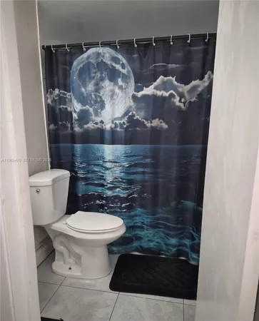a bathroom with a toilet