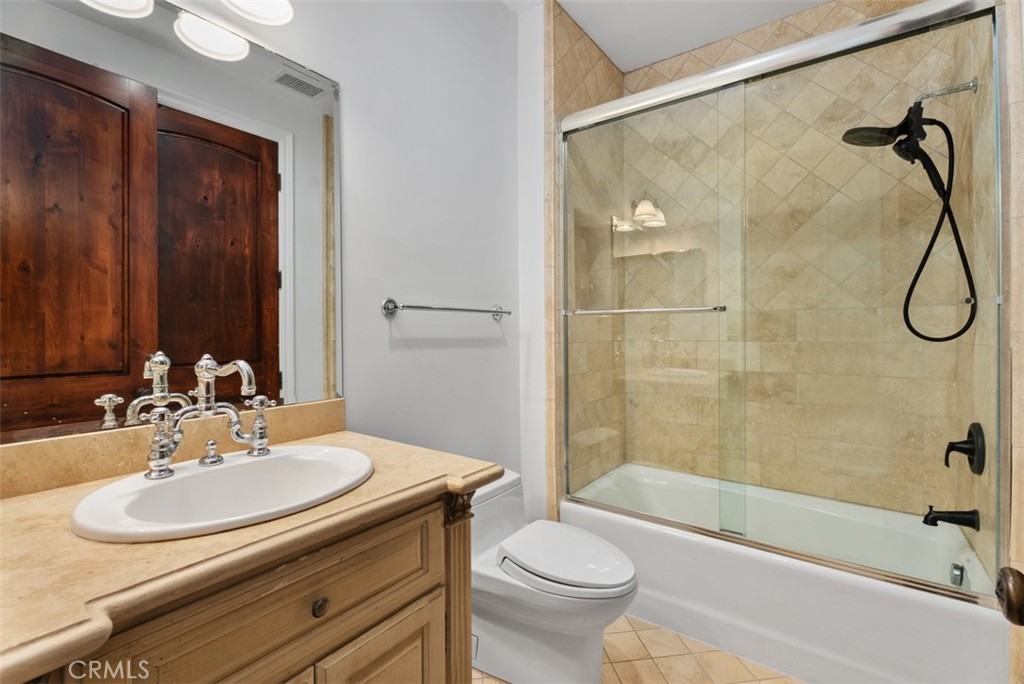 26509 Via Sacramento Dana Point, CA 92624 - Photo 14 of 52 a bathroom with a sink toilet and shower