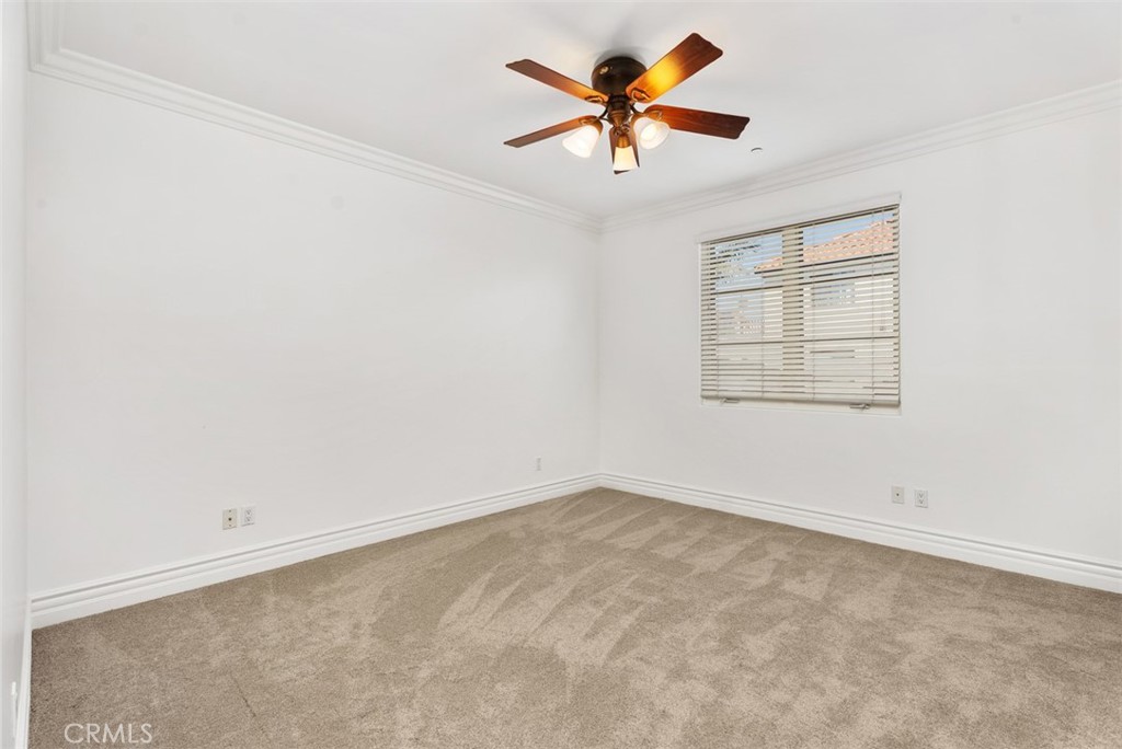 26509 Via Sacramento Dana Point, CA 92624 - Photo 21 of 52 an empty room with a window and a fan